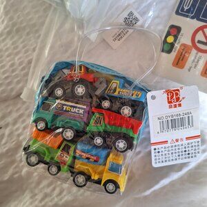 mini cars, signs with stickers and roadway